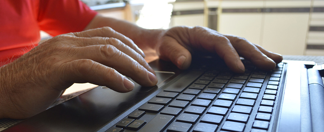 A photo of a person typing on a keyboard. A photo of a person typing on a keyboard.