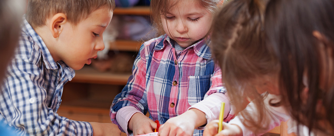 A photo of young children playing.