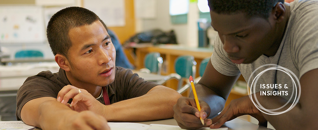 A photo of a student and teacher