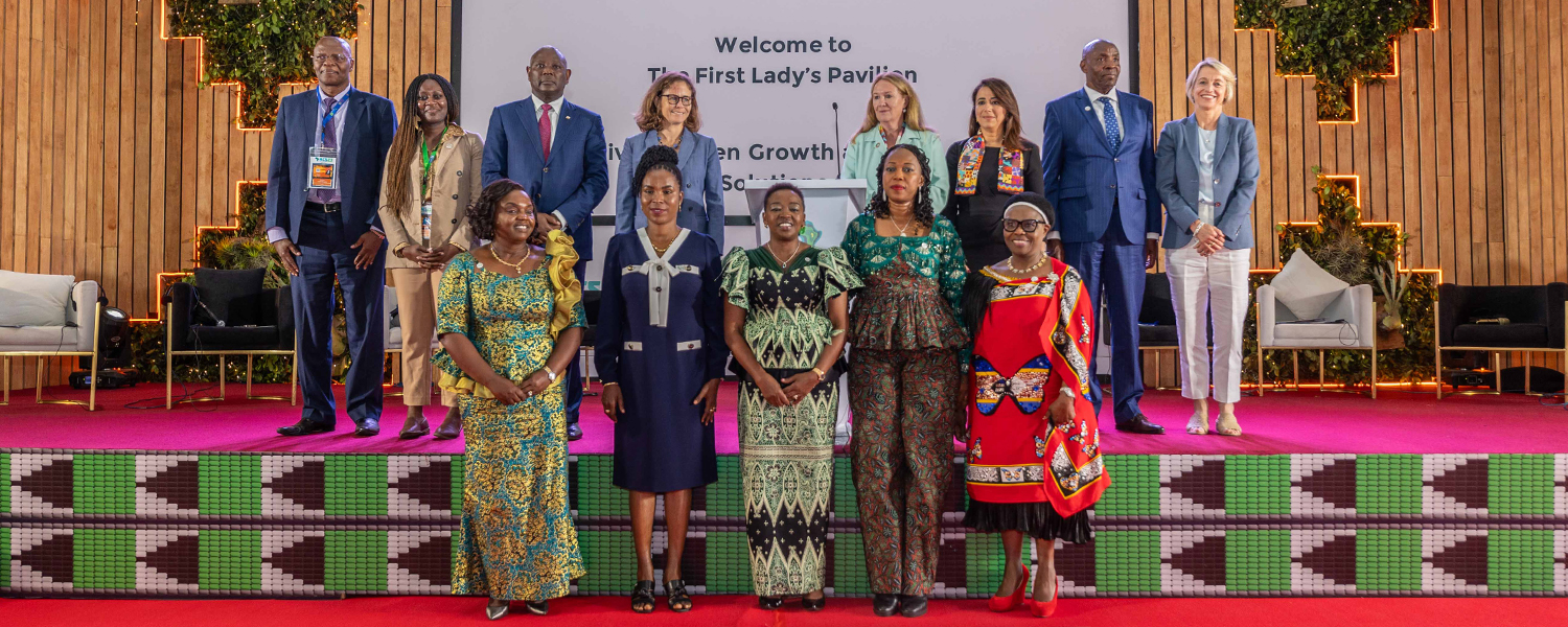 A group of African First Ladies private sector leaders stand onstage after The Big Opportunity Panel Discussion