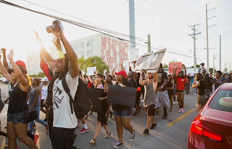 Racism is a Public Health Problem. What Can We Do? A photo of a protest representing Racism is a Public Health Problem. What Can We Do?
