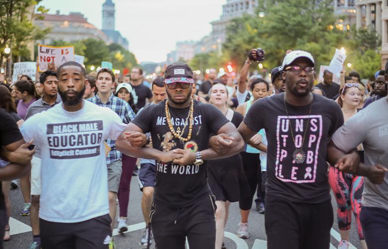 A photo of a protest representing “We Black Mothers”: A Poem