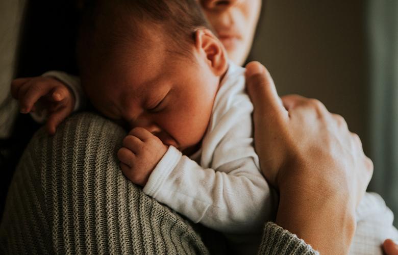 Promoting Mental Health during the Postpartum Period A photo of a mother and child