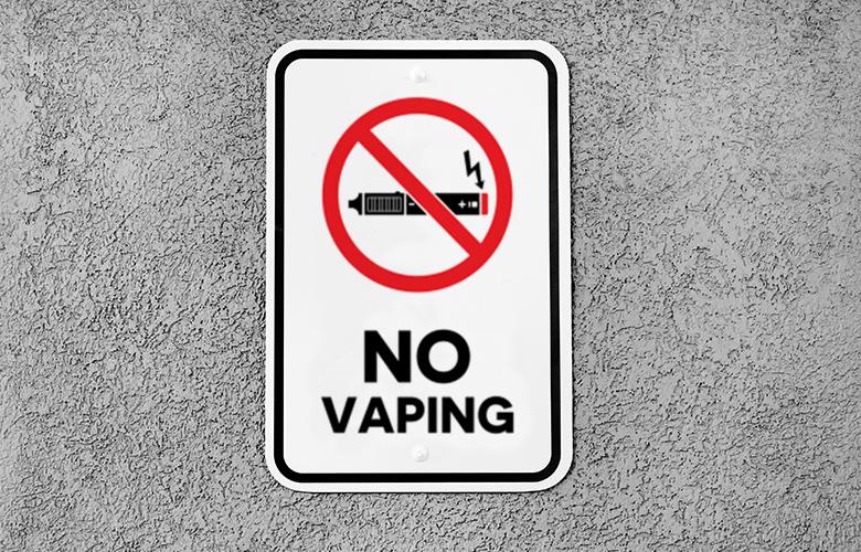 Reducing Teen Vaping: States and Communities Take the Lead A photo no vaping sign to represent Reducing Teen Vaping: States and Communities Take the Lead