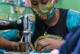 A photo of youth in DRC sewing face masks