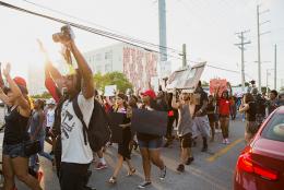 Racism is a Public Health Problem. What Can We Do? A photo of a protest representing Racism is a Public Health Problem. What Can We Do?