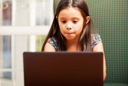 A photo of a child using a computer representing Resources for Schools and Districts Responding to the COVID-19 Crisis